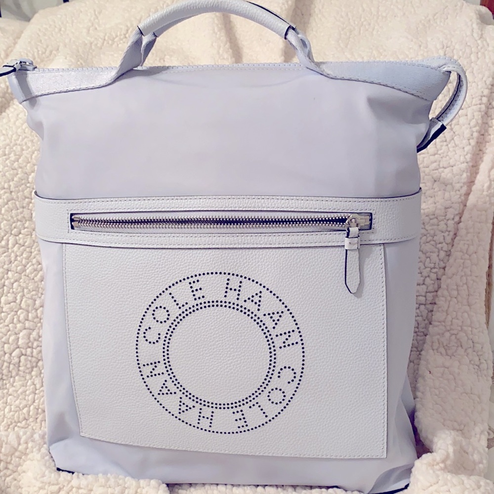 COLE HAAN canvas backpack. 15x15x5 inches.  ice blue.  Back trolly pass